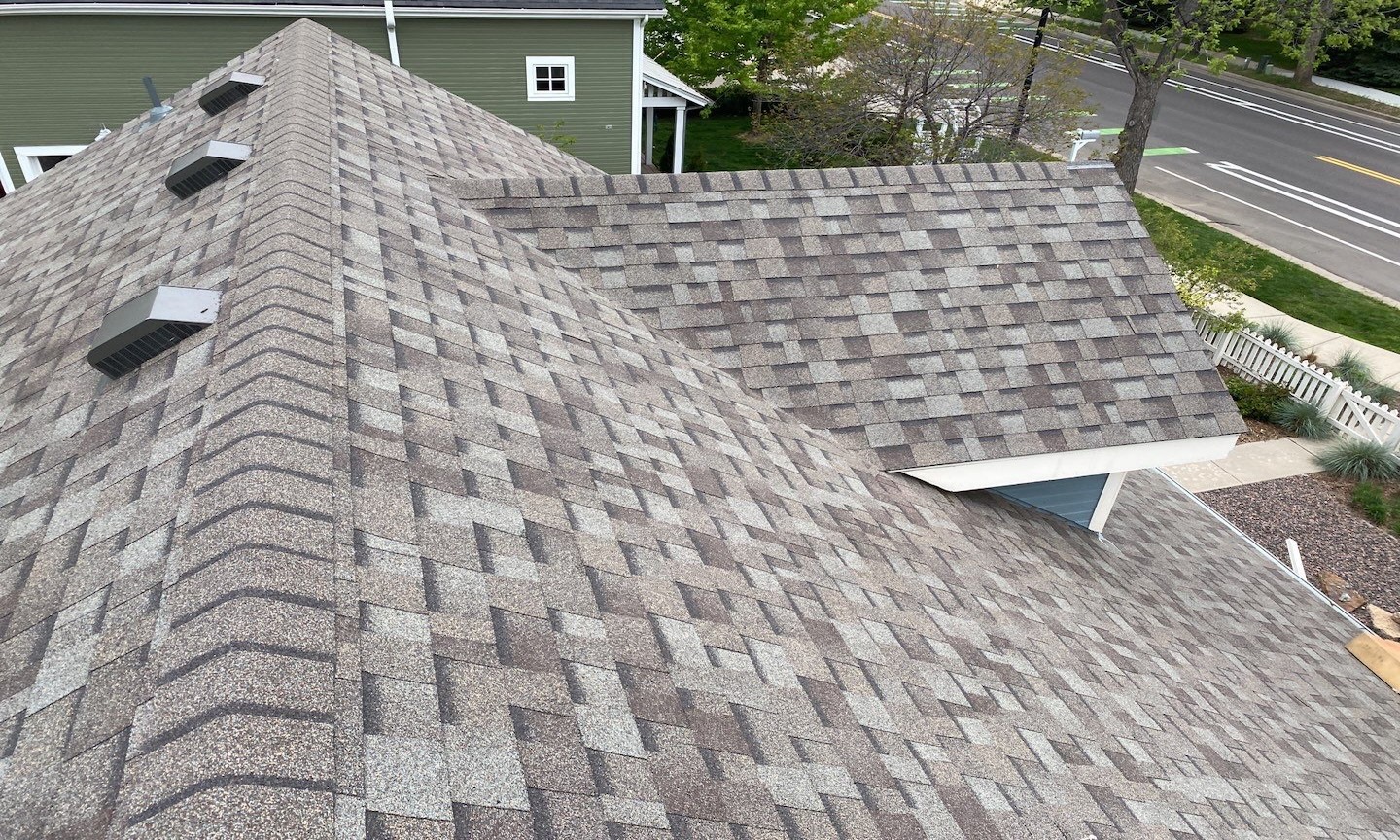 View from above of a shingled residential roof