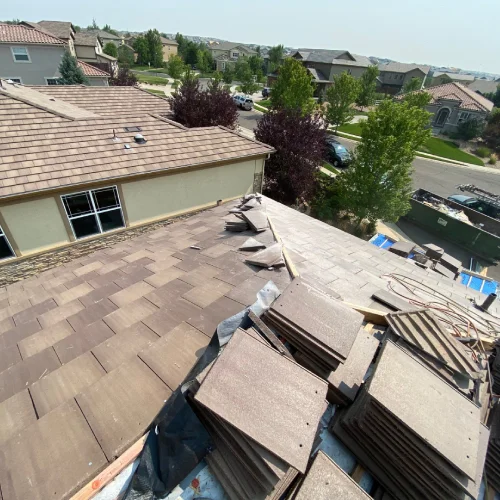 Residential roof installation with tile shingles by Mile High Roofing Services in Westminster, CO
