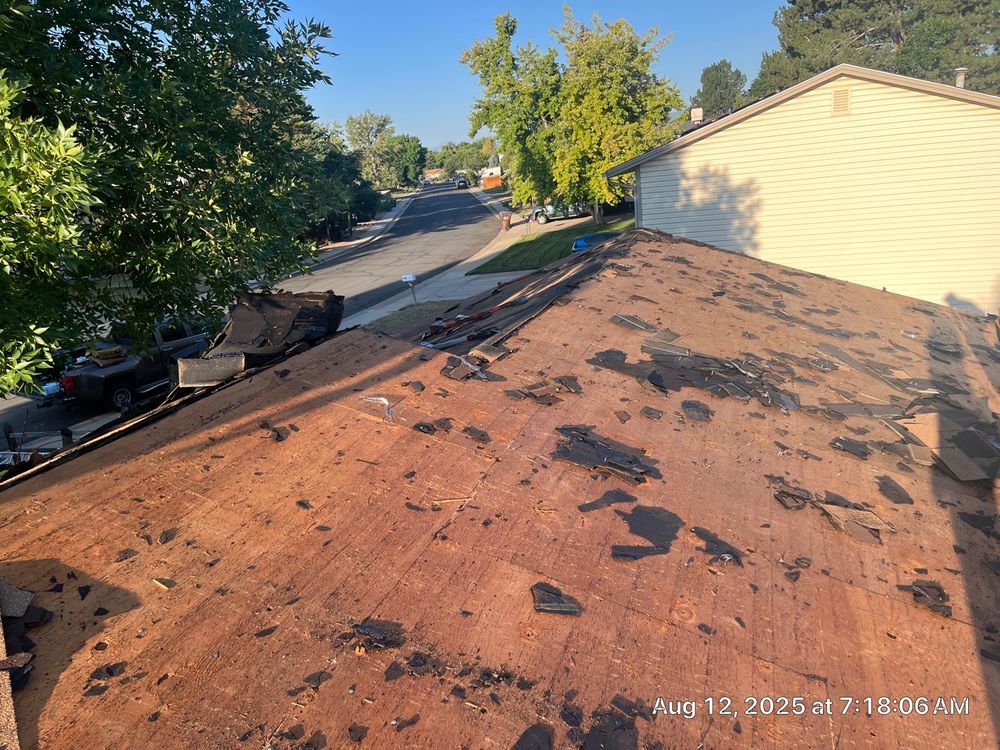 Old roofing removed during a Broomfield roof replacement